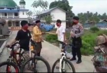 Aipda Peran Suhada Dan Ketiga Anaknya Bagikan Masker Buat Warga, Naik Sepeda Pemberian Kapoldasu Dan Kapolres Madina