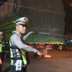 *Polisi Kawal Pemudik Motor dari Bakauheni Menuju Bandar Lampung